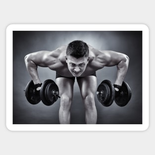 Athletic man working with heavy dumbbells Sticker